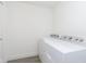 Bright laundry room with side-by-side washer and dryer at 1213 Cottage Ave, Indianapolis, IN 46203