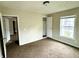 Well lit bedroom with closet and carpet at 1310 N Oakland Ave, Indianapolis, IN 46201