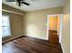 Simple bedroom with hardwood floors and a closet at 1310 N Oakland Ave, Indianapolis, IN 46201