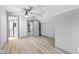 Bright bedroom featuring hardwood floors and access to a full bathroom at 1542 S Alabama St, Indianapolis, IN 46225