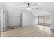 Spacious bedroom with ceiling fan and hardwood floors at 1542 S Alabama St, Indianapolis, IN 46225