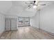 Charming bedroom with ceiling fan, hardwood floors, and ample natural light at 1542 S Alabama St, Indianapolis, IN 46225