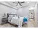 Main bedroom with a comfortable bed and ensuite access at 1542 S Alabama St, Indianapolis, IN 46225