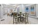 Dining area with a square table and four chairs, located near the living room at 1542 S Alabama St, Indianapolis, IN 46225
