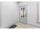 Modern entryway with gray door and light flooring at 1542 S Alabama St, Indianapolis, IN 46225