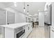Kitchen island with white cabinets and a built in microwave at 1542 S Alabama St, Indianapolis, IN 46225