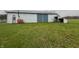 White barn with blue doors and a small shed at 3149 E 900 S, Flat Rock, IN 47234