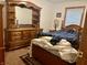 Spacious bedroom with wood furniture and carpeted floors at 3149 E 900 S, Flat Rock, IN 47234
