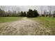 Gravel driveway leading to a large white barn at 3149 E 900 S, Flat Rock, IN 47234