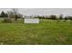 Farmland with a shed and a gate at 3149 E 900 S, Flat Rock, IN 47234