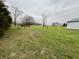 Open farmland with trees and a barn in the distance at 3149 E 900 S, Flat Rock, IN 47234