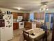 Eat in kitchen with wood cabinets and a table for four at 3149 E 900 S, Flat Rock, IN 47234