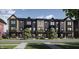 Modern townhome community with inviting curb appeal at 457 Shade St, Carmel, IN 46290