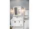 White bathroom vanity with marble countertop and modern fixtures at 700 S Ohio St, Sheridan, IN 46069