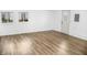 Bright bonus room features wood-look flooring and an exterior door at 700 S Ohio St, Sheridan, IN 46069