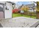 Back deck with metal railing and view of the neighbor's house at 700 S Ohio St, Sheridan, IN 46069