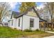 Side view of charming craftsman home with gray accents at 700 S Ohio St, Sheridan, IN 46069