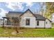 Charming one-story home with a gray roof and landscaping at 700 S Ohio St, Sheridan, IN 46069
