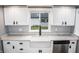 White farmhouse sink with modern faucet and quartz countertops at 700 S Ohio St, Sheridan, IN 46069
