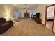 Living room with fireplace, TV area, and access to bedroom at 744 Helm Dr, Avon, IN 46123