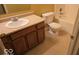 Clean bathroom with single sink vanity, toilet and shower/tub combo at 8235 Thorn Bend Dr, Indianapolis, IN 46278