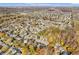 Aerial view of neighborhood in the fall season at 11411 Shady Hollow Ln, Indianapolis, IN 46229