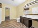Double vanity bathroom with a shower and mosaic tile at 11411 Shady Hollow Ln, Indianapolis, IN 46229