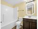 Clean bathroom featuring a tub, toilet and vanity at 11411 Shady Hollow Ln, Indianapolis, IN 46229