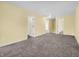 Upper level hallway with access to bedrooms and stairs at 11411 Shady Hollow Ln, Indianapolis, IN 46229