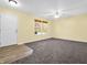 Spacious living room with hardwood and carpeted floors at 11411 Shady Hollow Ln, Indianapolis, IN 46229