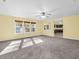 Spacious living area with an open kitchen and natural light at 11411 Shady Hollow Ln, Indianapolis, IN 46229