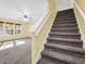 Staircase leading to the upper level of the home at 11411 Shady Hollow Ln, Indianapolis, IN 46229
