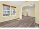 Sunroom with hardwood floors and a view of the backyard at 11411 Shady Hollow Ln, Indianapolis, IN 46229