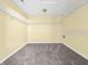 Spacious walk-in closet with wire shelving and carpeting at 11411 Shady Hollow Ln, Indianapolis, IN 46229