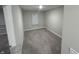 Spacious bedroom with neutral carpeting and window at 1202 Langham St, Avon, IN 46123