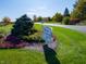 Entrance to Avon Gardens, featuring a sign and landscaping at 2309 Pine Valley Dr, Plainfield, IN 46168