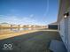 Backyard with a view of a pond and other houses at 3234 W Keepsake Ln, Monrovia, IN 46157