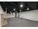 Finished basement with a fireplace and bar area at 3805 Byram Ave, Indianapolis, IN 46208