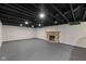 Finished basement with fireplace and bar area at 3805 Byram Ave, Indianapolis, IN 46208