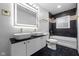 Modern bathroom with double sinks, marble countertops, and dark tile floors at 3805 Byram Ave, Indianapolis, IN 46208