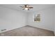 Bright bedroom with neutral carpeting and large window at 3805 Byram Ave, Indianapolis, IN 46208