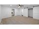 Bright bedroom with double barn doors and access to other rooms at 3805 Byram Ave, Indianapolis, IN 46208