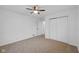 Bright bedroom with neutral carpeting and double door closet at 3805 Byram Ave, Indianapolis, IN 46208
