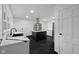 Modern kitchen featuring a large island and stainless steel appliances at 3805 Byram Ave, Indianapolis, IN 46208