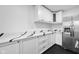Modern kitchen with white cabinets and quartz countertops at 3805 Byram Ave, Indianapolis, IN 46208