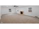 Living room with fireplace, ceiling fan, and carpet at 3805 Byram Ave, Indianapolis, IN 46208