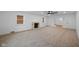 Spacious living room with a fireplace and carpeting at 3805 Byram Ave, Indianapolis, IN 46208