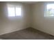 Bright bedroom with neutral walls and carpeted floor at 3936 Delmont Dr, Indianapolis, IN 46235