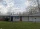 Brick ranch house with attached garage at 3936 Delmont Dr, Indianapolis, IN 46235