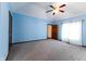 Spacious bedroom with neutral carpeting and ceiling fan at 4257 Tattersall Dr, Plainfield, IN 46168
